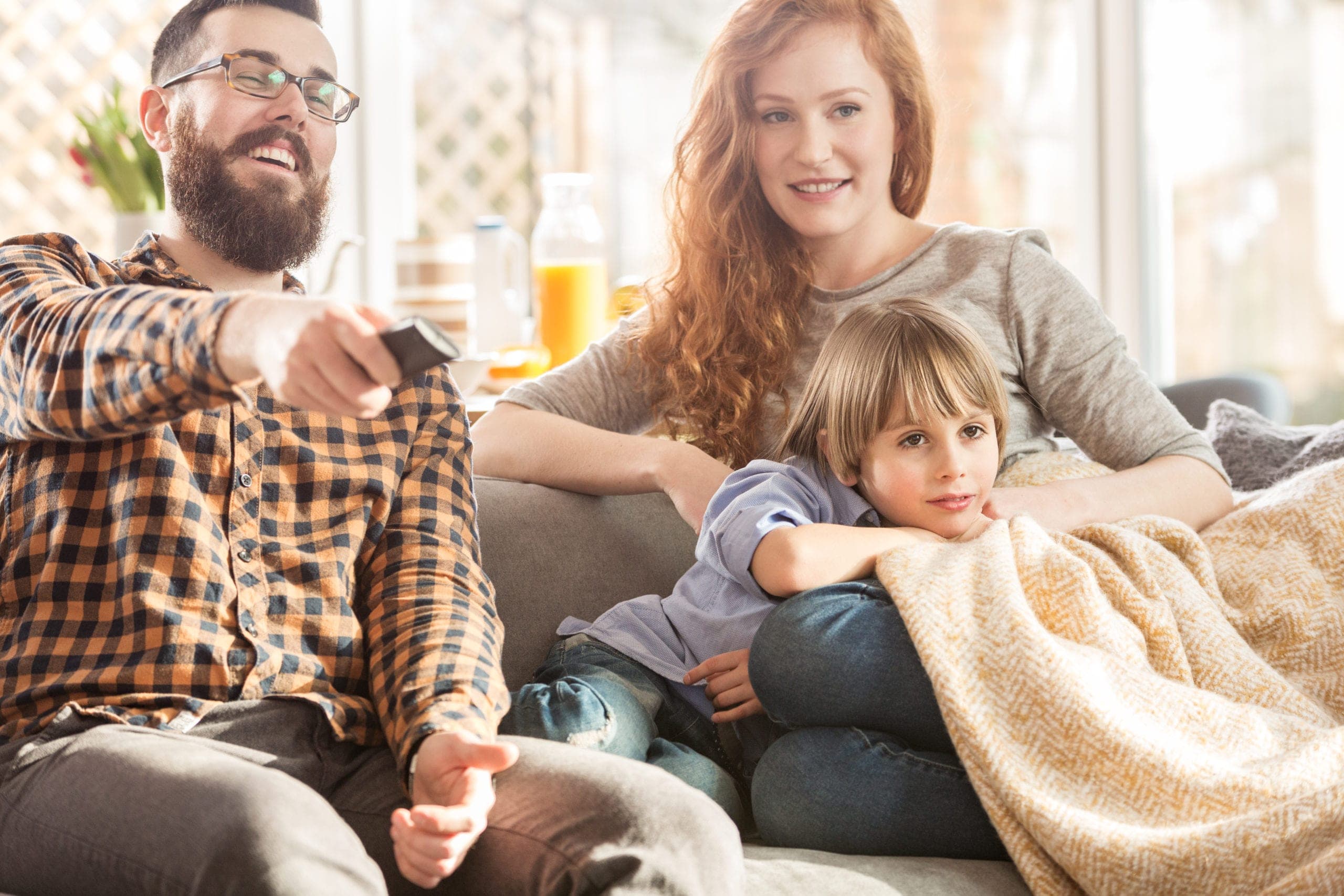 A Rockford family smiling together at home
